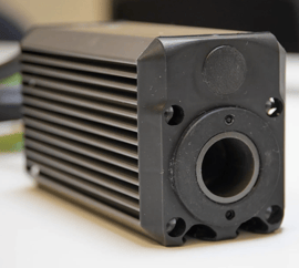 Close-up of an ORCA™ Series Smart Linear Motor housing with the shaft removed, showing the G bushing inside the circular opening.